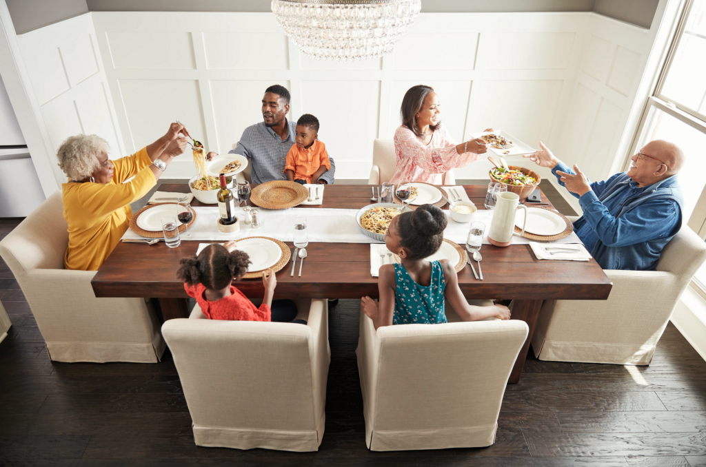 Family enjoys meal | Johnston Paint & Decorating